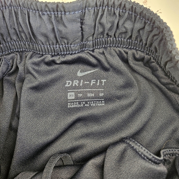 Nike Black and White Athletic Shorts with Dolphin Hem, Size XS - Picture 3 of 4